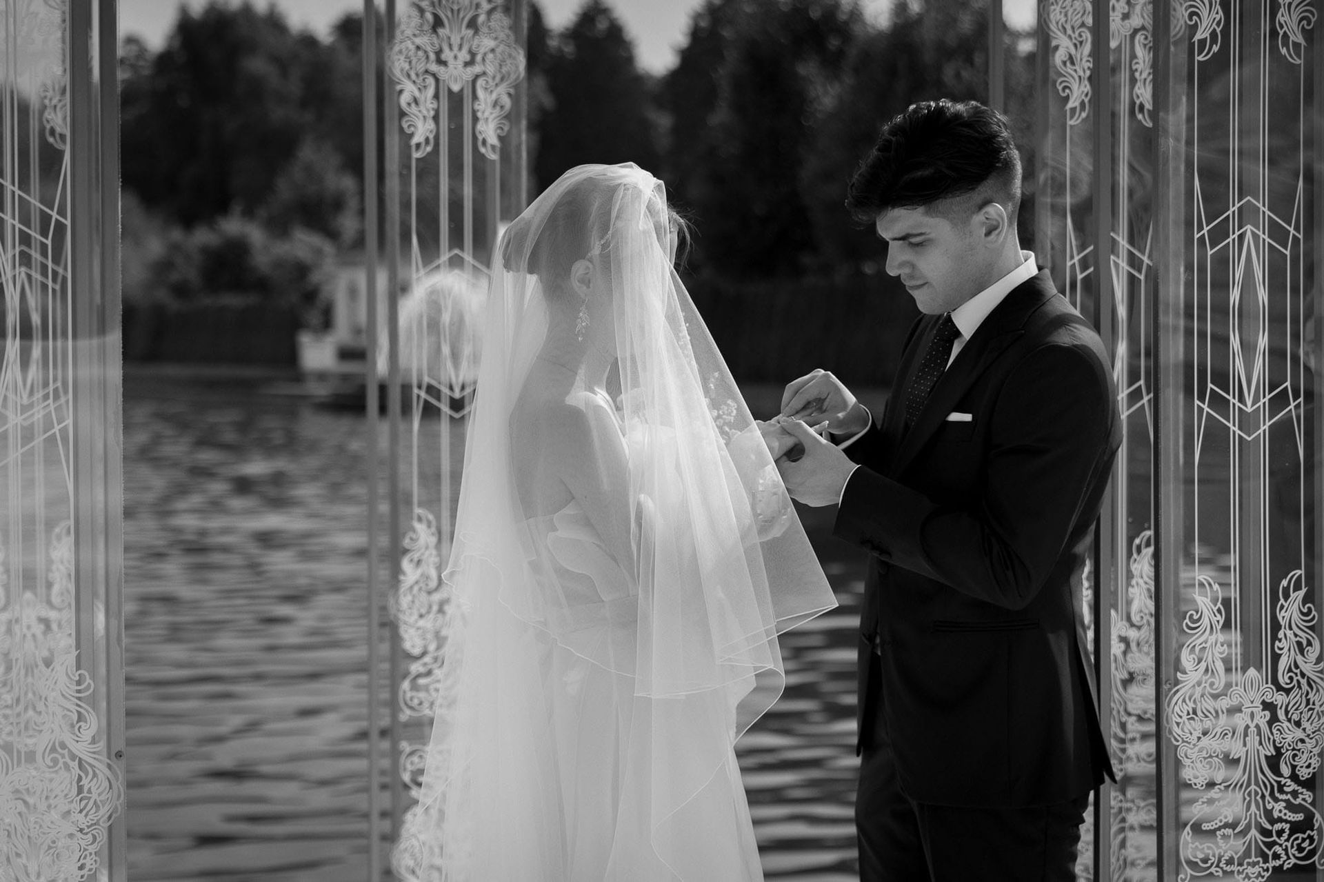 Bride and groom exchanging wedding rings during their destination wedding ceremony