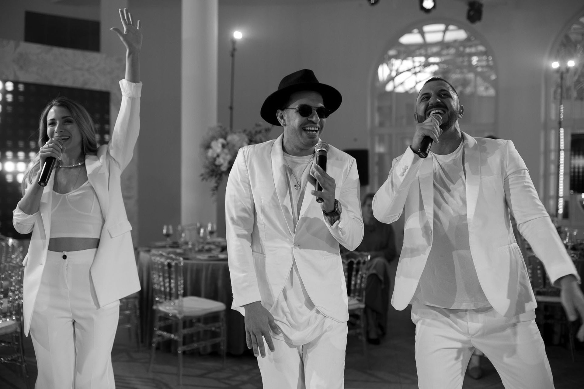 Live singers performing for guests during a destination wedding reception