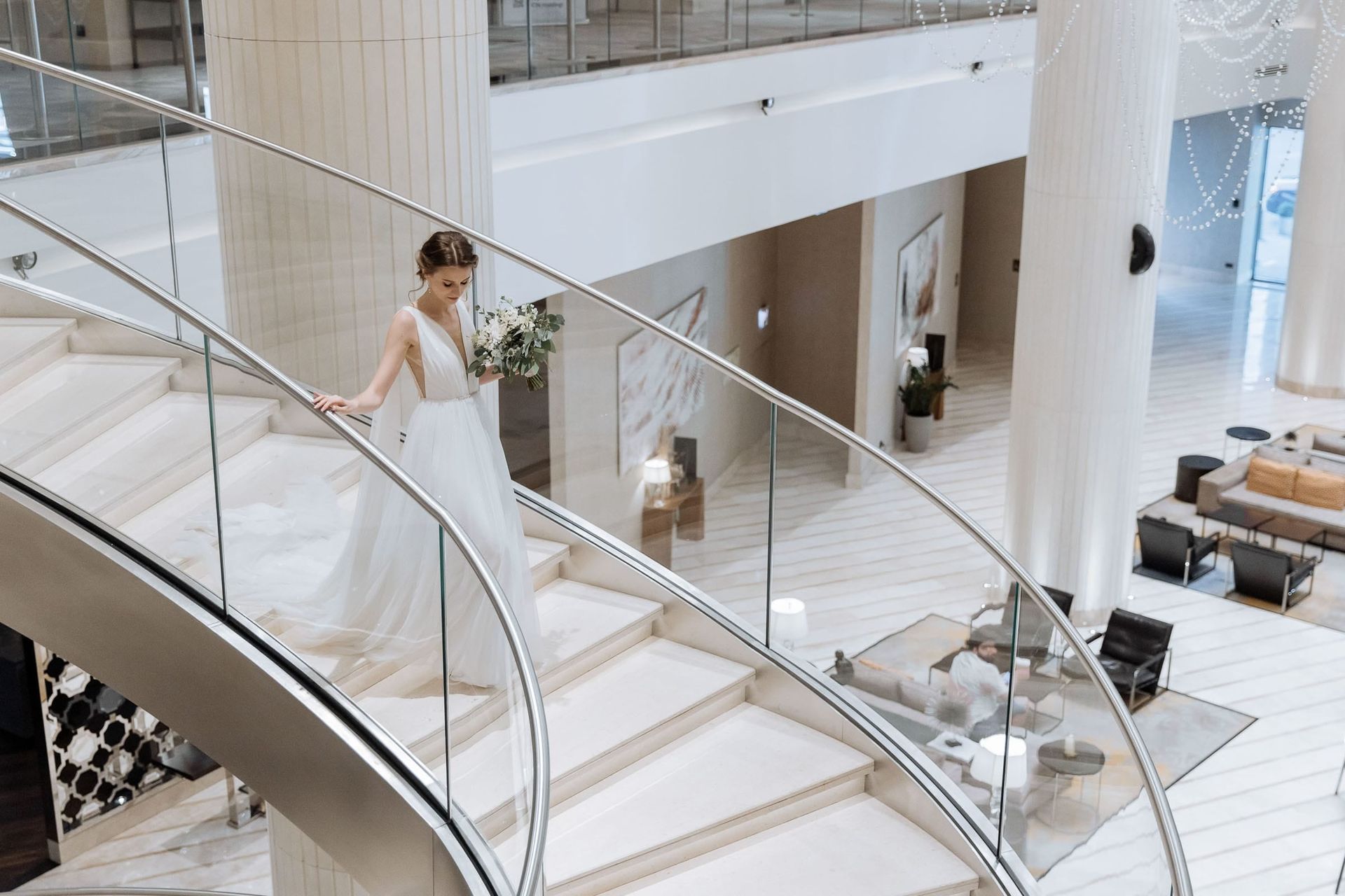 Reportage-style wedding photography of a couple’s first look on the stairs by Tanya Bogdan.