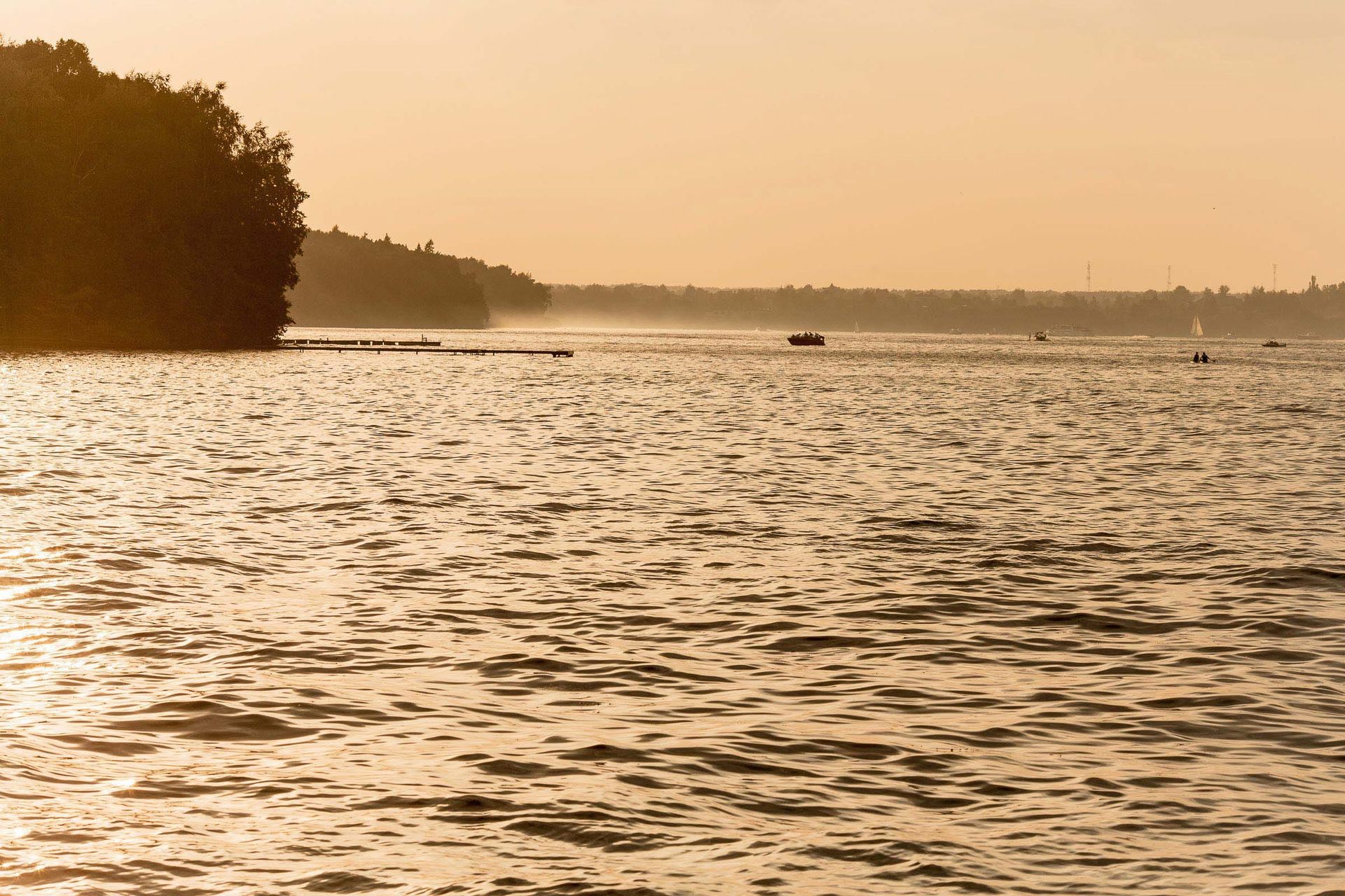 Sunset at a riverside wedding venue, photographed by a Cornwall wedding photographer.