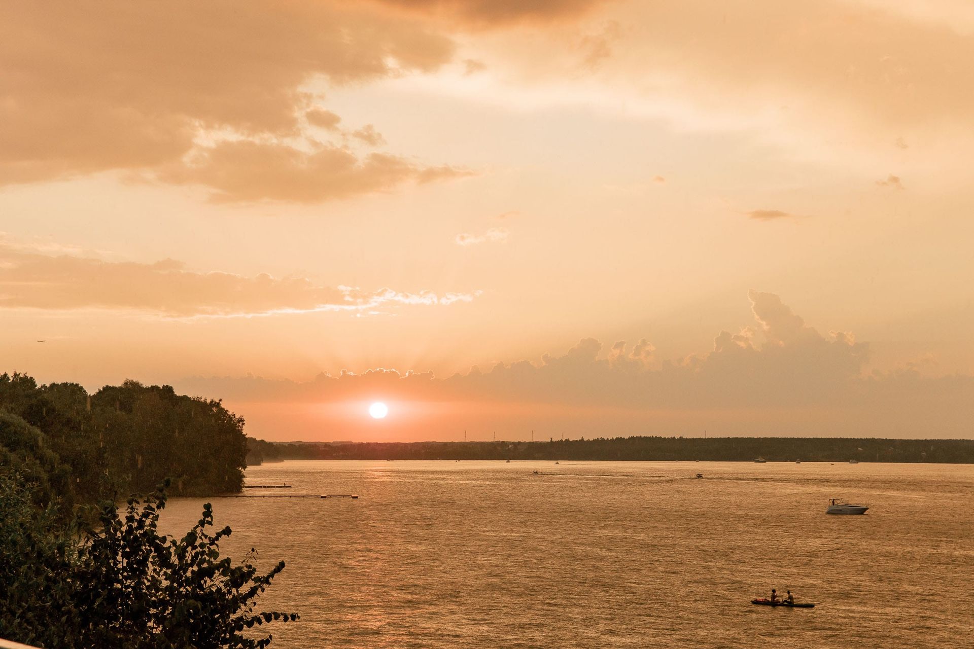 Sunset at a riverside wedding venue, photographed by a Cornwall wedding photographer.