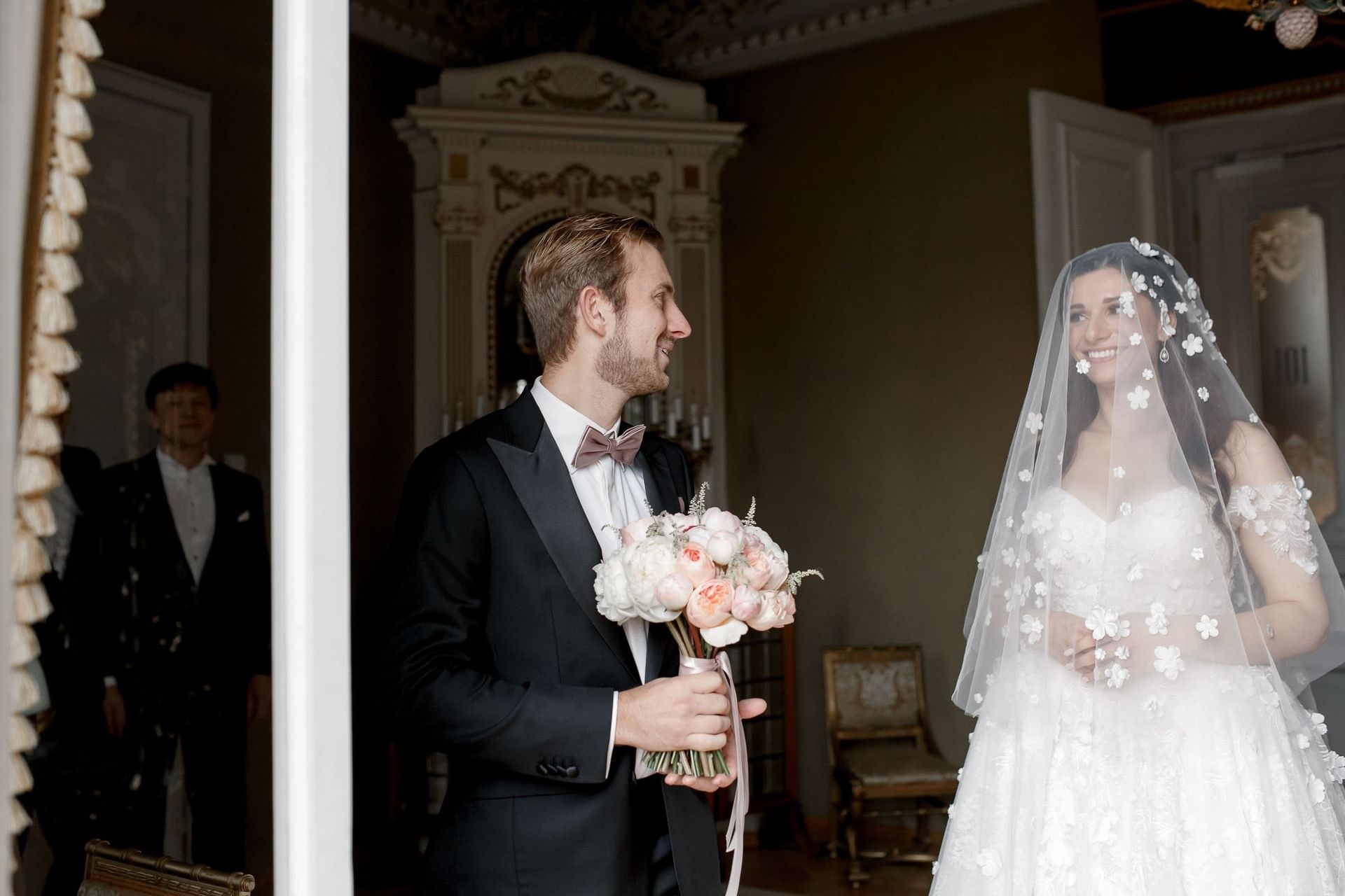 A luxury editorial first look moment captured by London wedding photographer Tanya Bogdan.