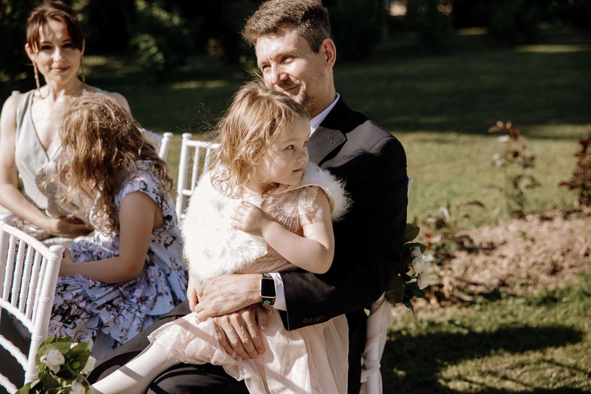 Documentary wedding photography of guests reacting emotionally, captured by Tanya Bogdan.