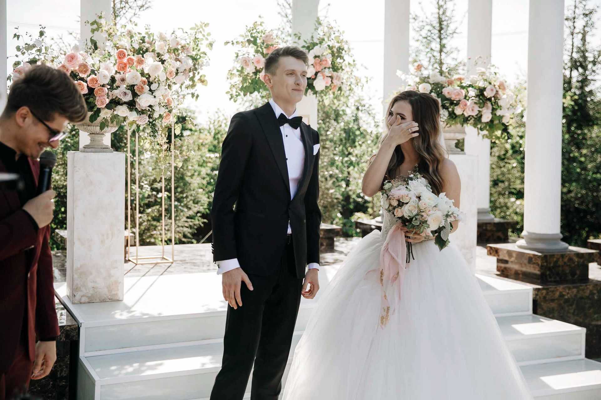 Heartfelt documentary photography of the couple meeting at the altar by Tanya Bogdan.