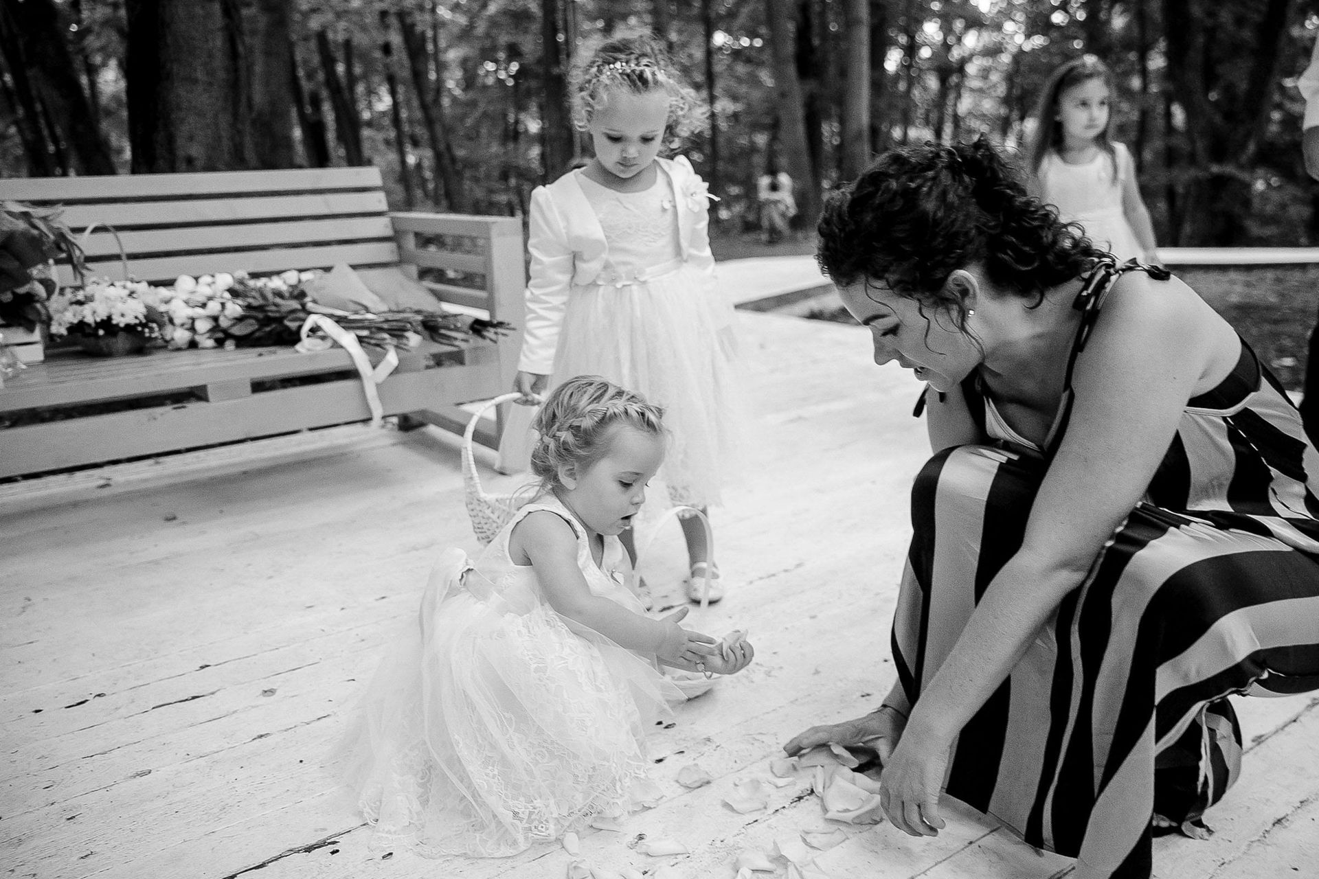 Candid documentary photography of flower girls at a luxury wedding by Tanya Bogdan.