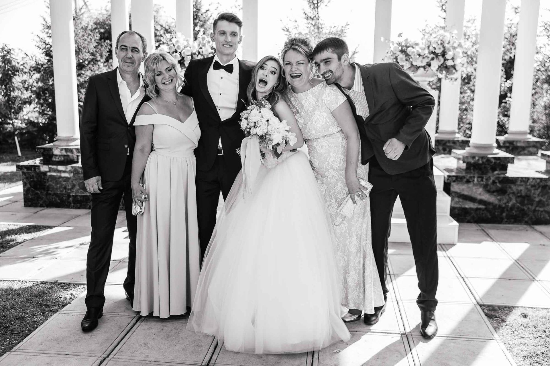 An editorial-style funny family portrait in black and white by Tanya Bogdan.