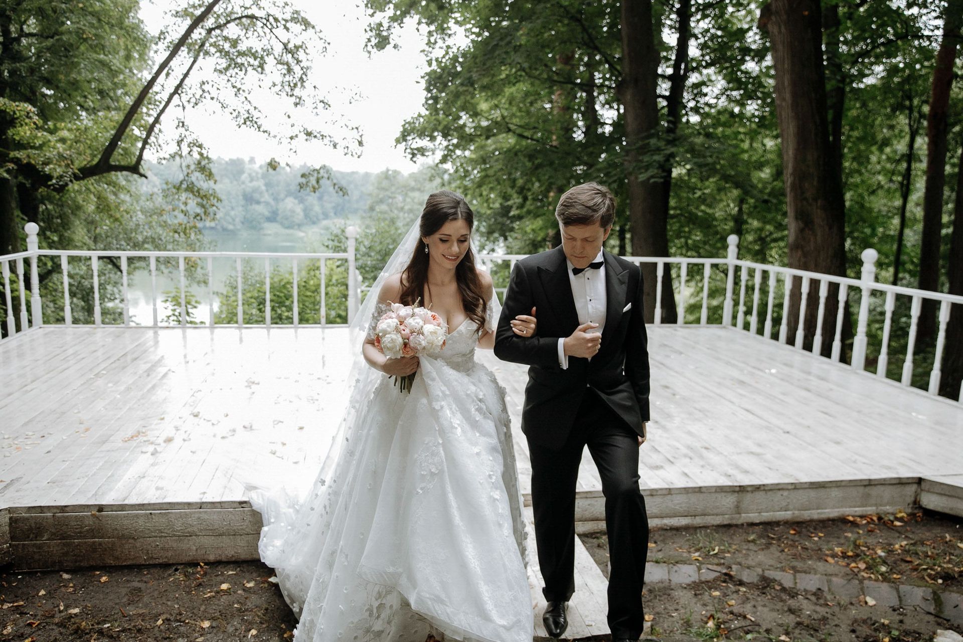 Candid documentary photography of an emotional aisle walk by Tanya Bogdan, serving Devon and Cornwall.