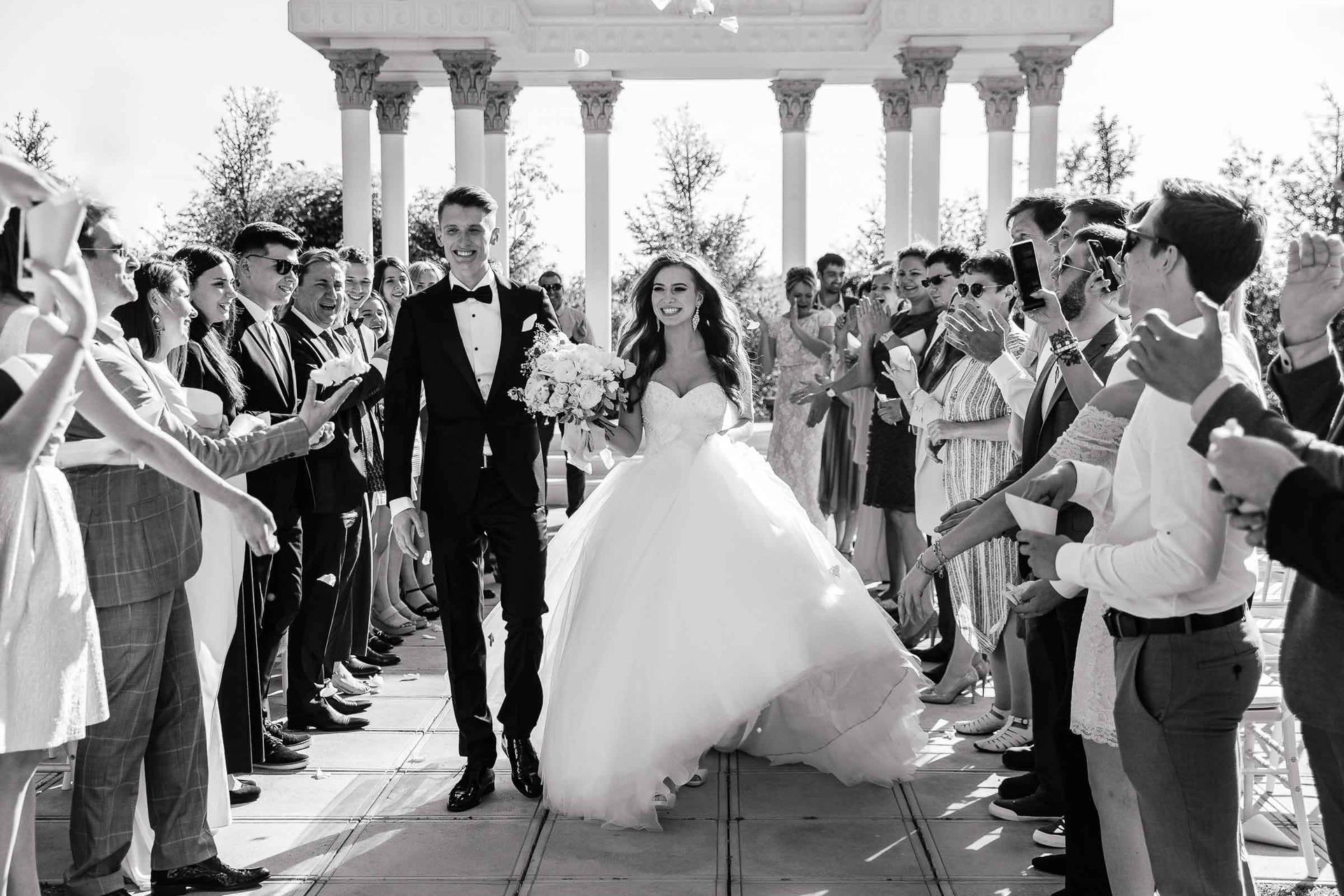 A joyful documentary recessional shot of the couple by Tanya Bogdan.
