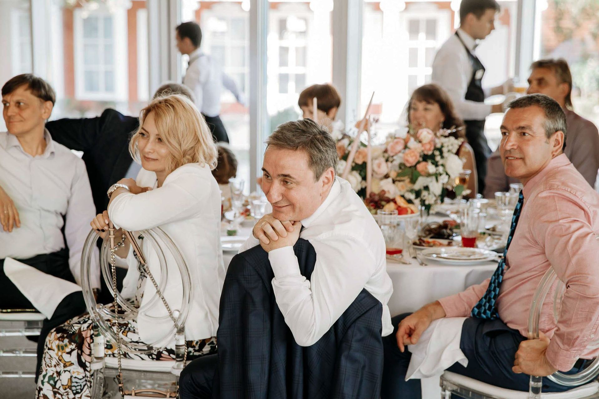 A stylish shot capturing the laughter and joy of guests by Tanya Bogdan.