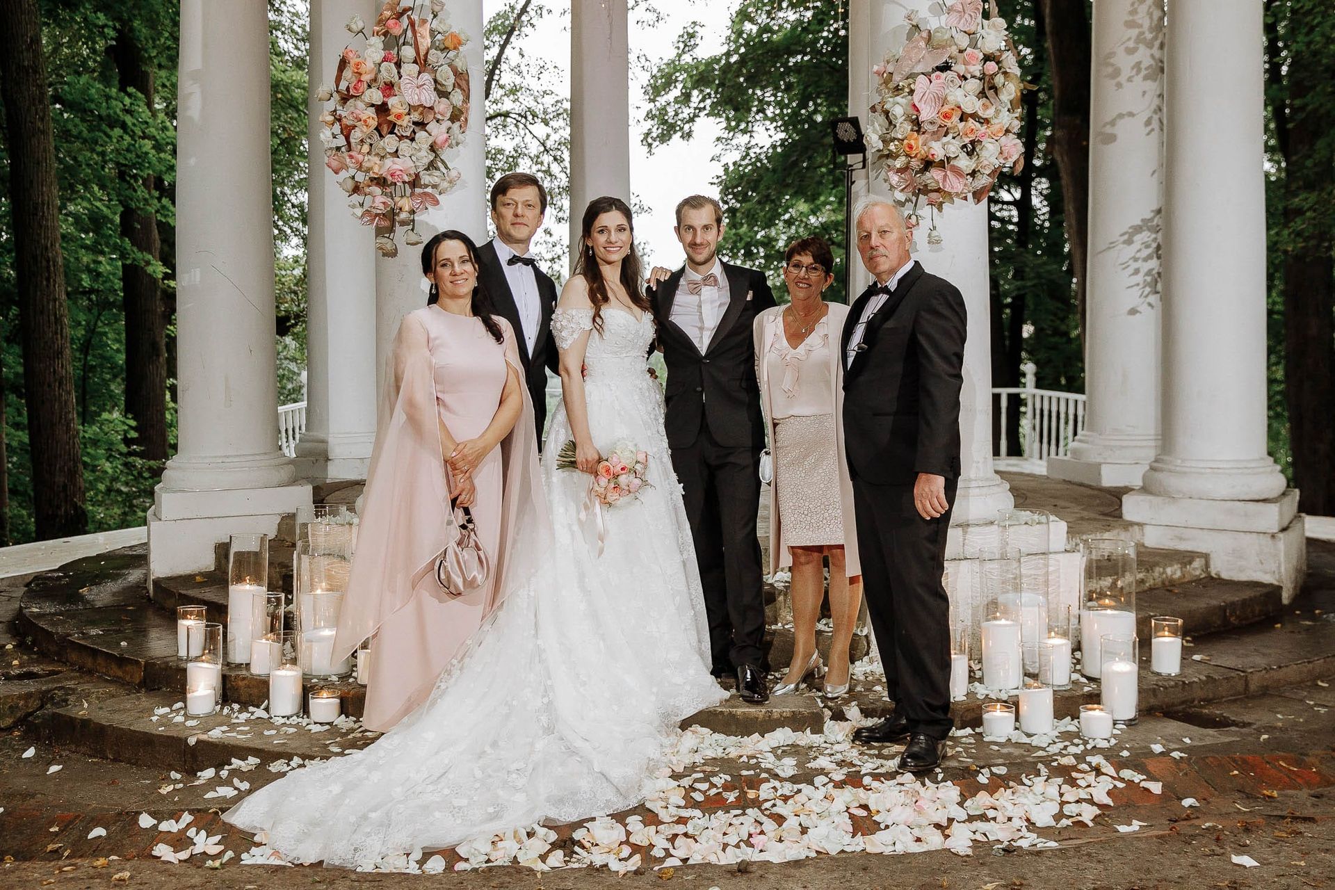 A stylish family portrait at an outdoor ceremony location by Tanya Bogdan.