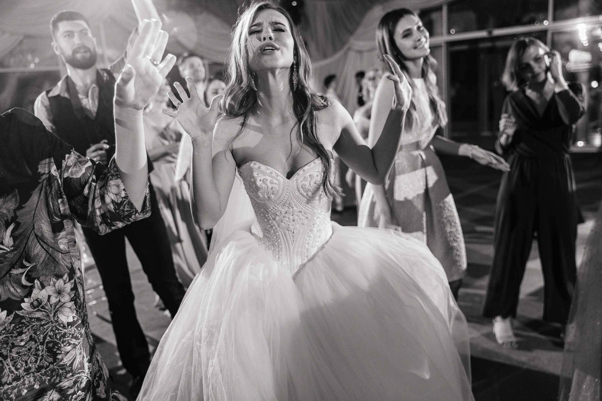 Joyful documentary photography of the bride dancing by Tanya Bogdan.
