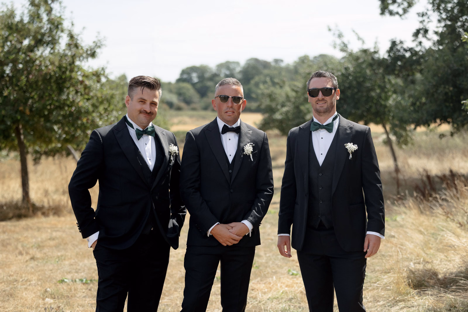 Groom and groomsmen portrait at a Taunton farm wedding, photographed by Tanya Bogdan Photography