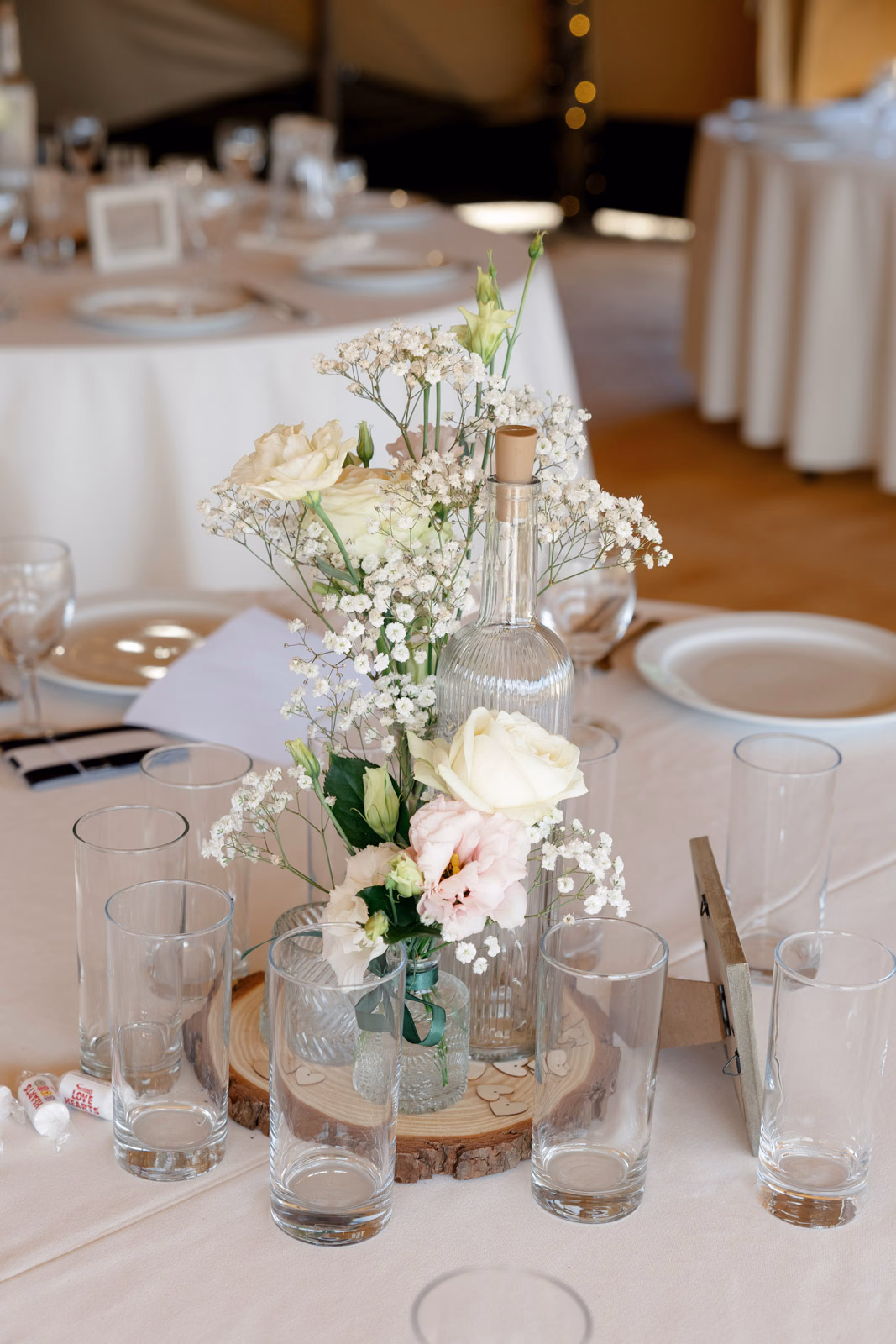 Table centrepiece flowers reception detail at a countryside wedding in Taunton, Somerset