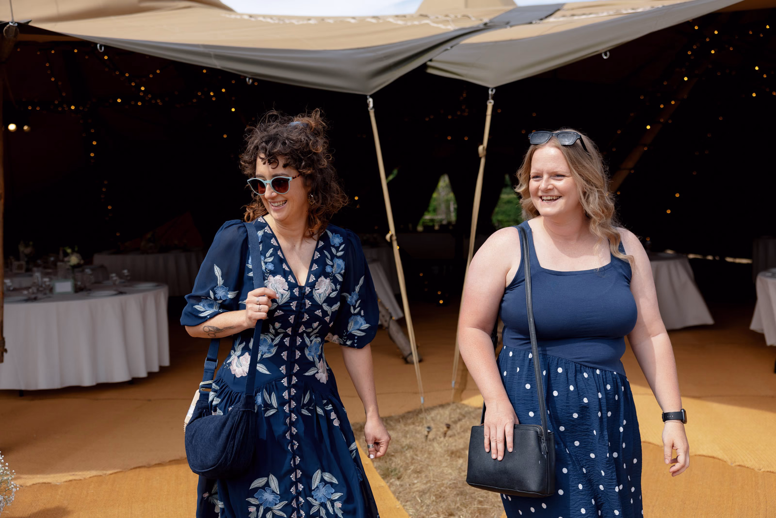 Guests in tipi before ceremony at a Taunton farm wedding, photographed by Tanya Bogdan Photography