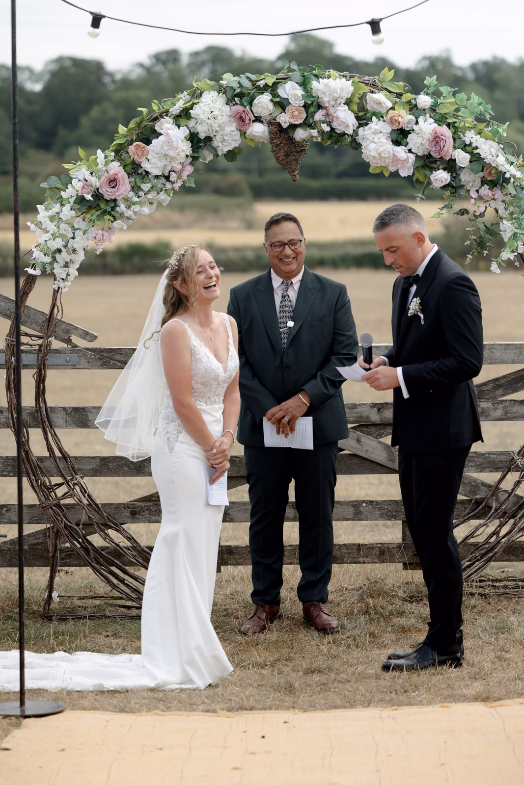 Bride and groom ceremony vows celebrant at a family farm wedding in Taunton