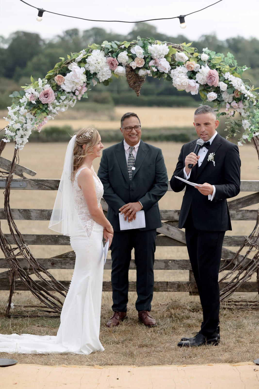 Groom reading vows ceremony at a Taunton farm wedding, photographed by Tanya Bogdan Photography