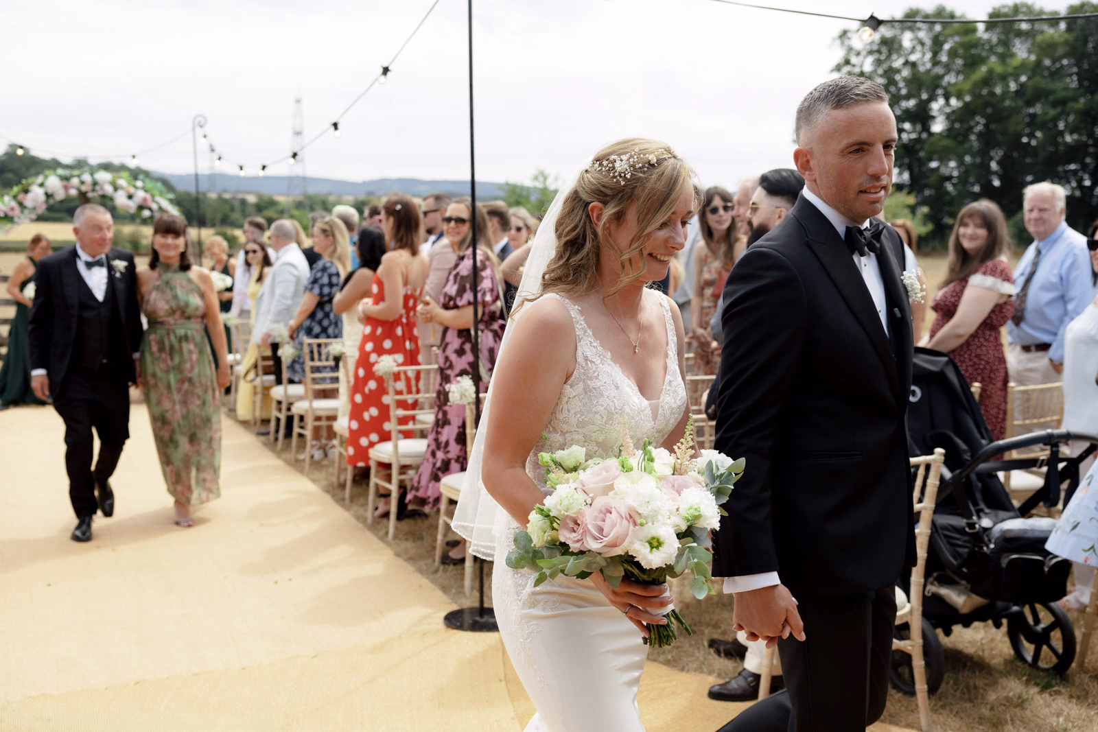 Bride and groom recessional aisle at a countryside wedding in Taunton, Somerset