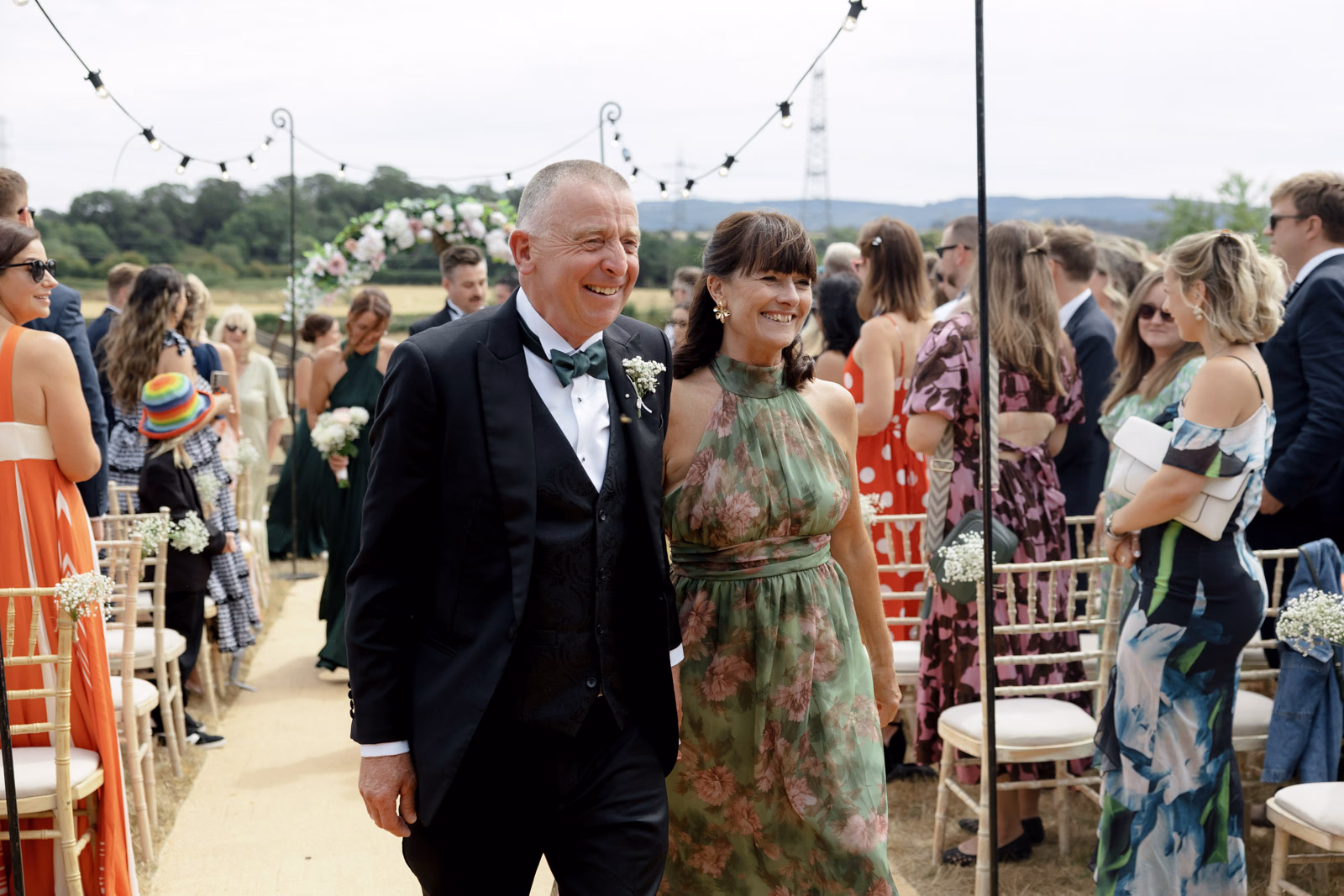 Parents aisle after ceremony close-up at a family farm wedding in Taunton