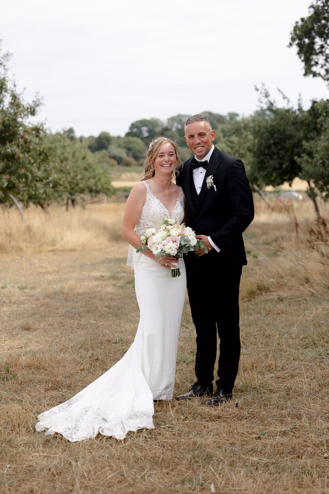 Bride and groom portrait orchard at a countryside wedding in Taunton, Somerset