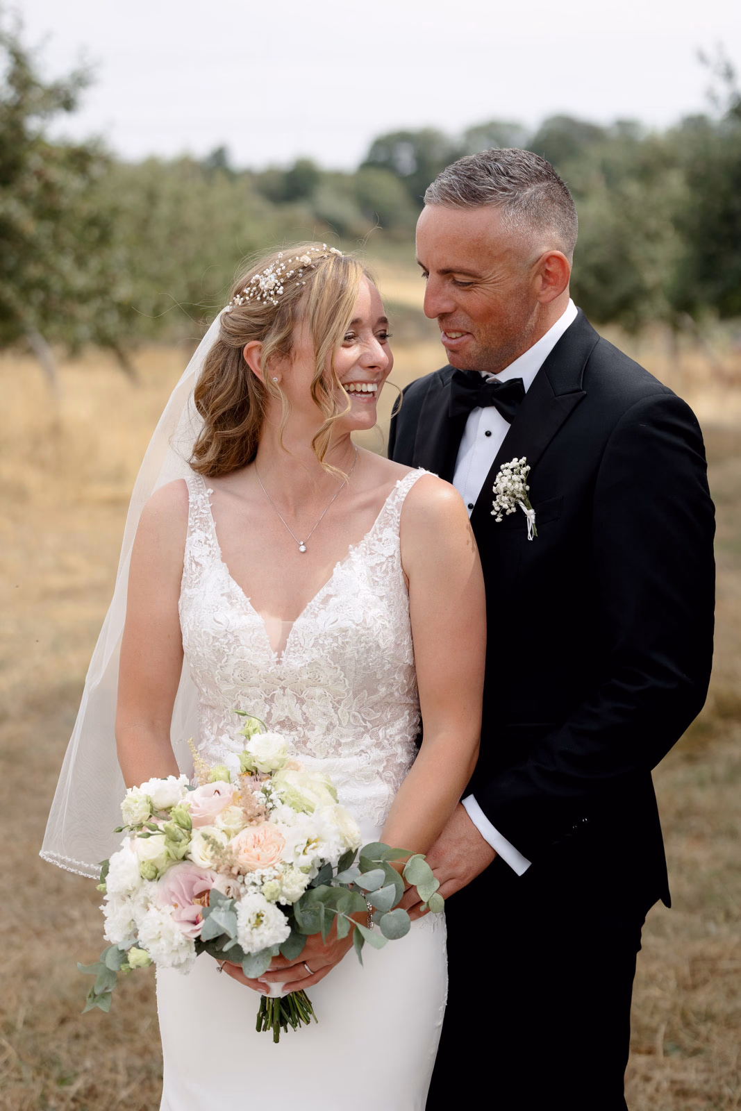 Bride and groom portrait bouquet at a Taunton farm wedding, photographed by Tanya Bogdan Photography