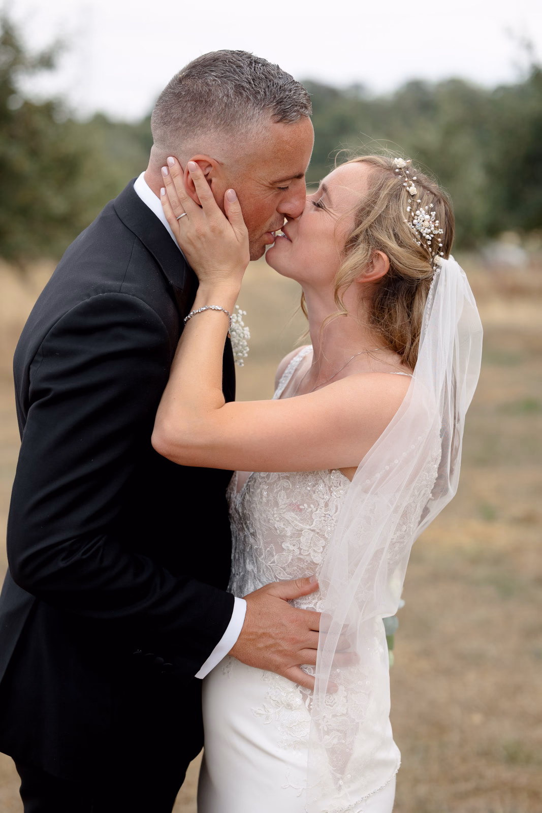 Bride and groom romantic kiss at a countryside wedding in Taunton, Somerset