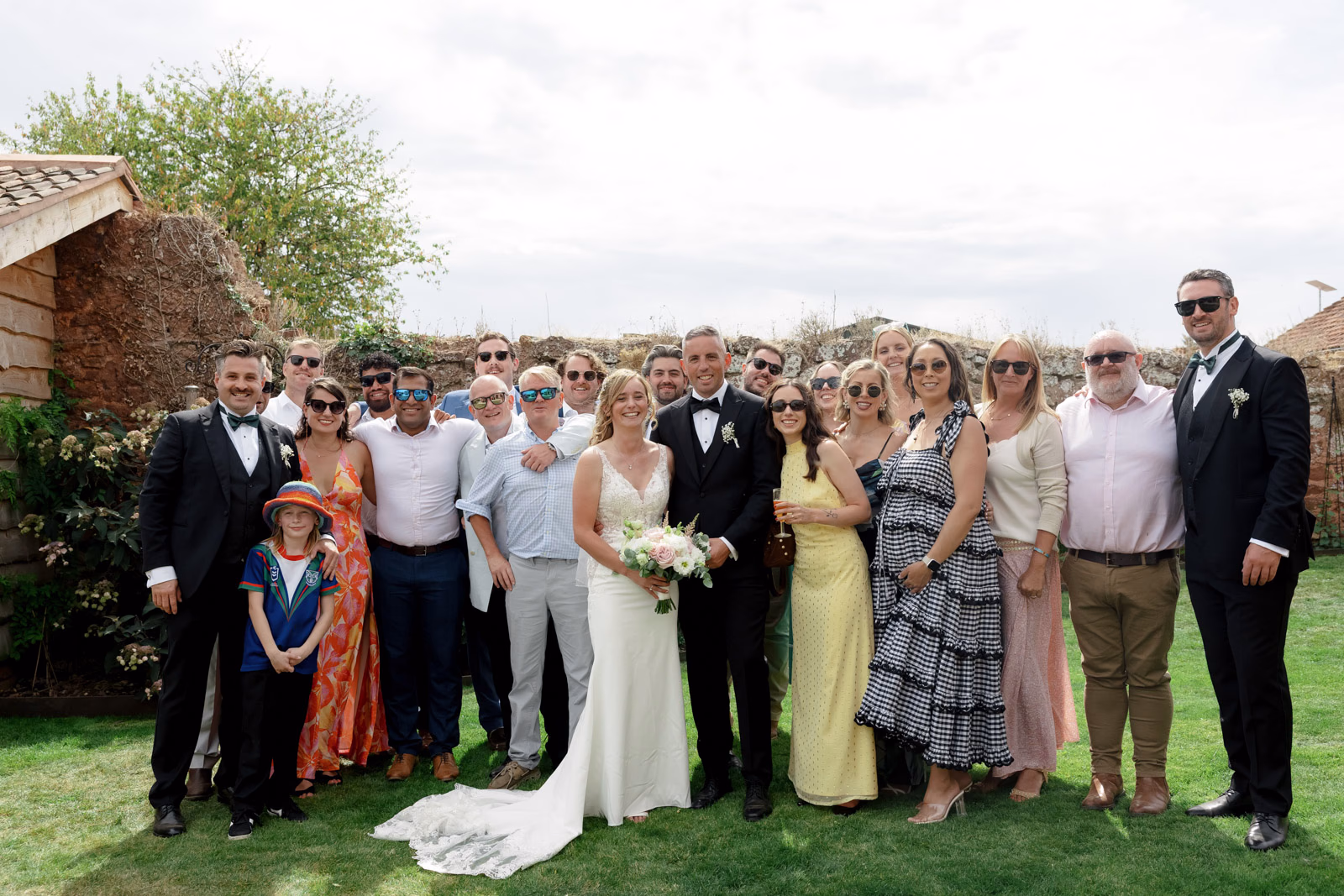 Large group photo wedding guests walled garden at a countryside wedding in Taunton, Somerset