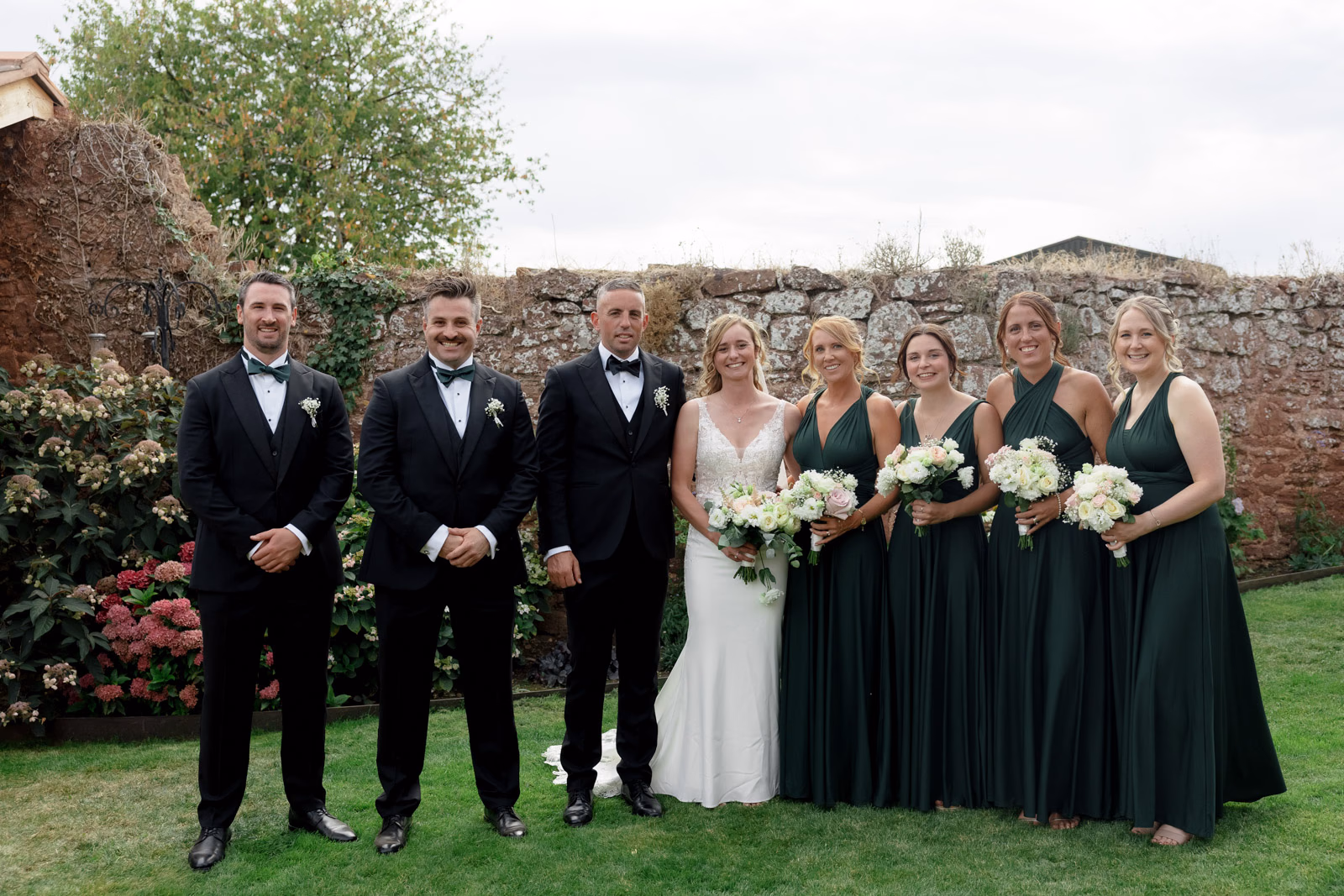 Bridal party group photo walled garden at a Taunton farm wedding, photographed by Tanya Bogdan Photography