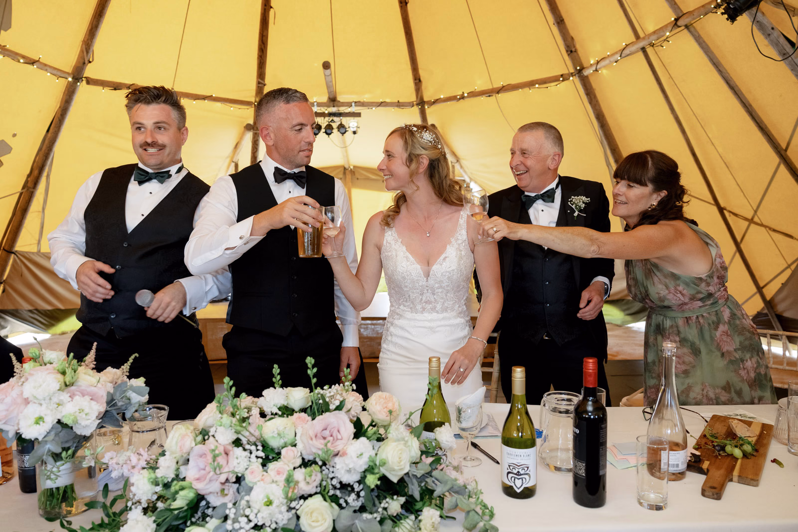 Top table toast wedding breakfast at a family farm wedding in Taunton