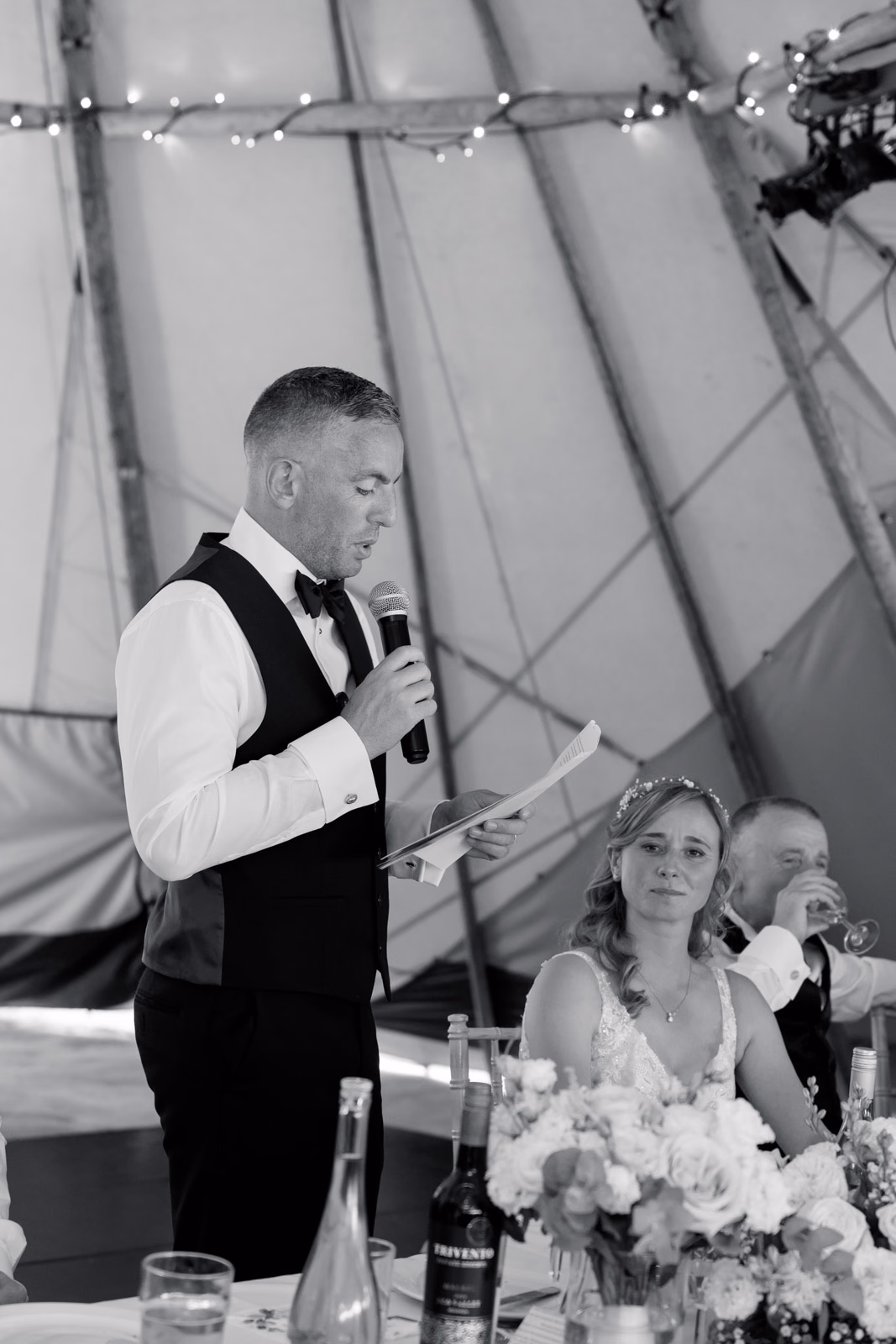 Groom speech black-and-white at a family farm wedding in Taunton