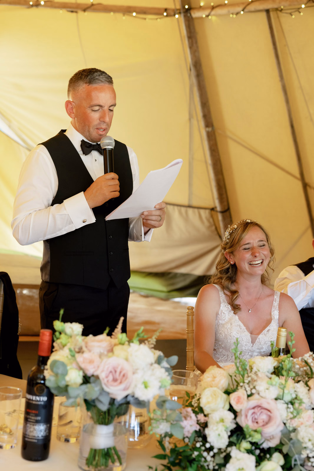 Groom speech bride smiling at a countryside wedding in Taunton, Somerset
