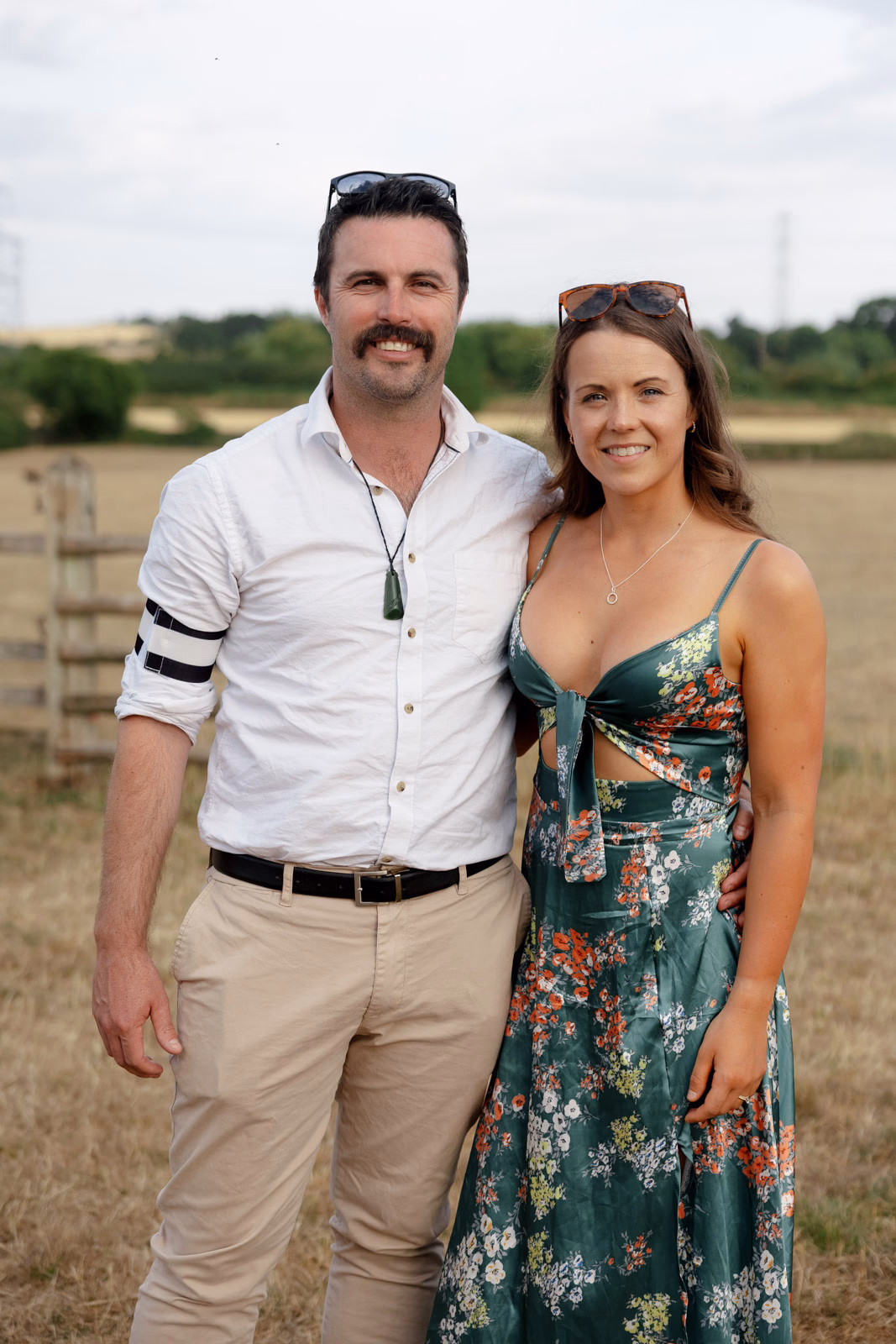 Guest couple portrait evening light at a family farm wedding in Taunton