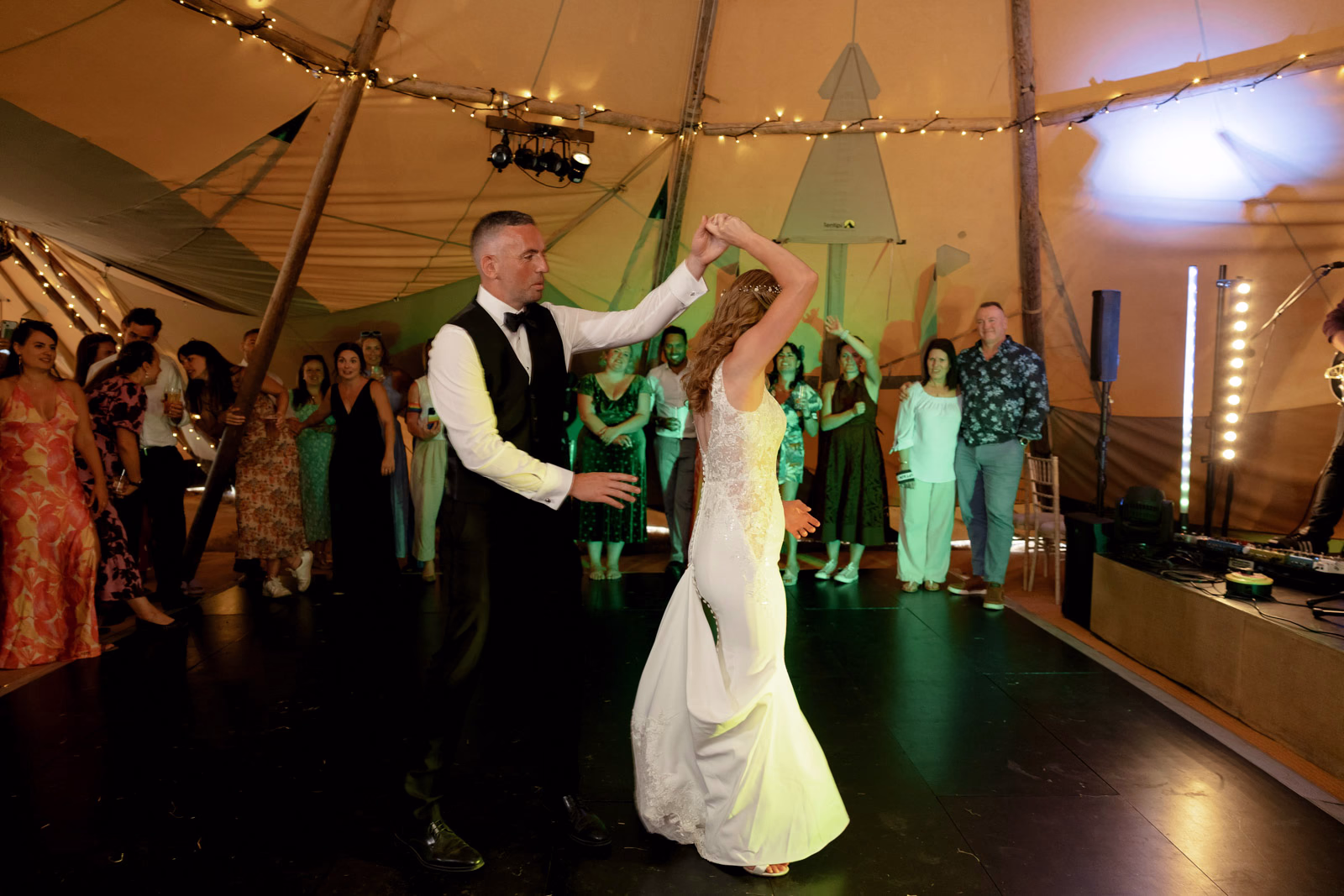 First dance twirl tipi at a family farm wedding in Taunton