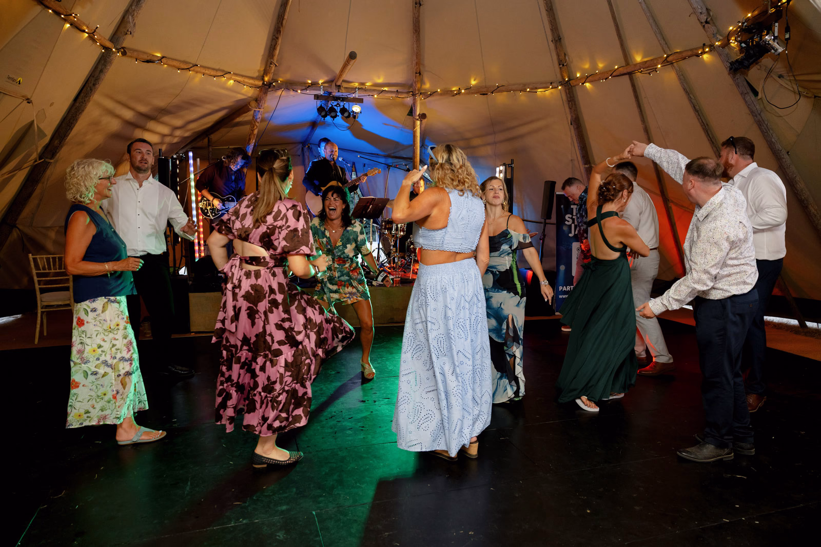 Couples dancing tipi evening at a family farm wedding in Taunton